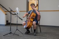 A freedom Academy delegate plays cello.