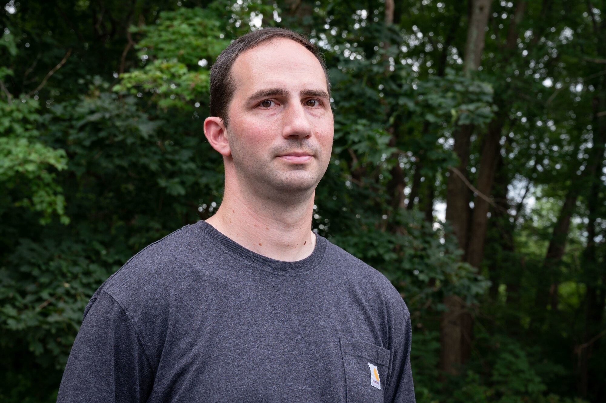Air Force Staff Sgt. Nathan Pisani, assigned to the 103rd Logistics Readiness Squadron, prepares to speak about how he helped his neighbors escape from a fire, August 30, 2021 in Vernon, Connecticut. Pisani potentially saved the lives of more than a dozen people during the blaze. (U.S. Air National Guard photo by Master Sgt. Tamara R. Dabney)