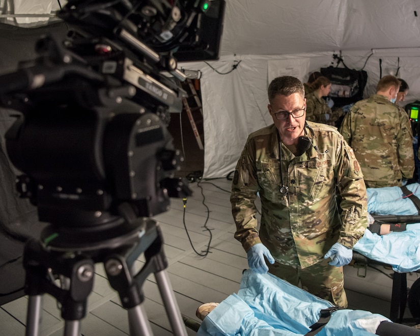 Lt. Col. Stephen Sample, an emergency medicine physician from the Kentucky Air National Guard’s 123rd Medical Group Detachment 1, is filmed tending to simulated patients at the Kentucky Air National Guard Base in Louisville, Ky., on April 16, 2021. The footage is being used for a national ad campaign funded by the National Guard Bureau to advertise the Air National Guard. (U.S. Air National Guard photo by Tech. Sgt. Joshua Horton)