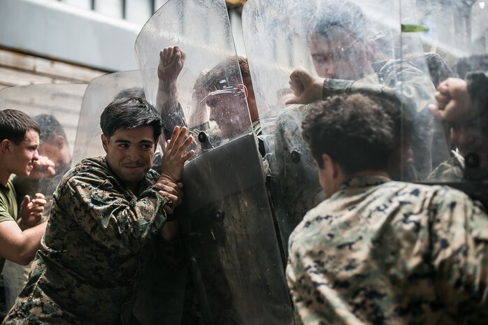 U.S. Marines conduct riot control training aboard dock landing ship USS Ashland (LSD 48), in the Philippine Sea, Jan. 25.