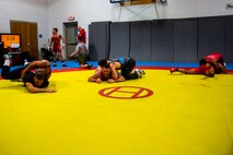 U.S. Marines with the All-Marine Wrestling Team (AMWT), practice wrestling techniques to prepare for the Olympic Trials, on Marine Corps Air Station New River, North Carolina, Jan. 8, 2021. Members of the AMWT are preparing for the trials, scheduled for April 2021 at Penn State University, for a chance to represent the U.S. in the 2020 Olympics. (U.S. Marine Corps photo by Lance Cpl. Christian Ayers)
