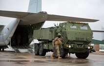 U.S. Marines conduct checks on a M142 High Mobility Artillery Rocket System after being unloading from a Lockheed C-130 Hercules during  training on Marine Corps Air Station New River, North Carolina, Jan. 26, 2020. MCAS New River provided training that included unloading M142 HIMARS from a Lockheed C-130. (U.S. Marine Corps photo by Cpl. Ginnie Lee)