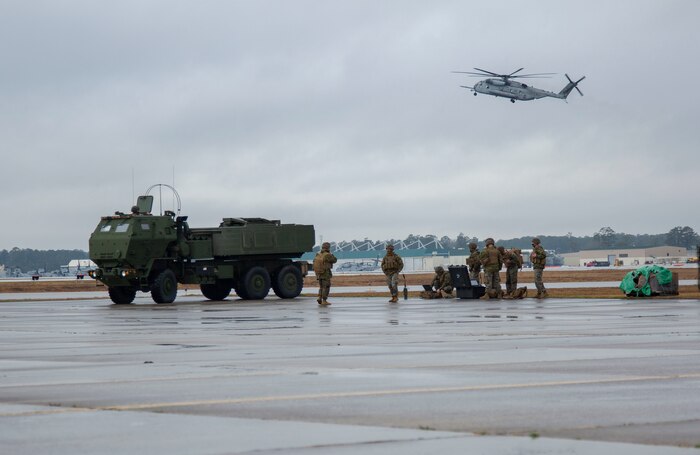 U.S. Marines conduct training on a M142 High Mobility Artillery Rocket System on Marine Corps Air Station New River, North Carolina, Jan. 26, 2020. MCAS New River provided training that included unloading M142 HIMARS from a Lockhead C-130 Hercules. (U.S. Marine Corps photo by Cpl. Ginnie Lee)