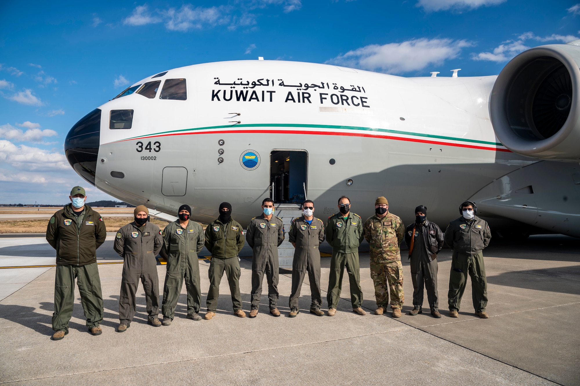 U.S. Air Force and Kuwait air force members pose for a group photo at Dover Air Force Base, Delaware, Jan. 22, 2021. This year, the U.S. and Kuwait celebrate the 30th anniversary of Operation Desert Storm, which serves as a key milestone in U.S.-Kuwaiti cooperation and helped cement Kuwait’s role as a regional leader in the promotion of peace and security. Due to its strategic geographic location, Dover AFB supports approximately $3.5 billion worth of foreign military sales operations annually. (U.S. Air Force photo by Senior Airman Christopher Quail)