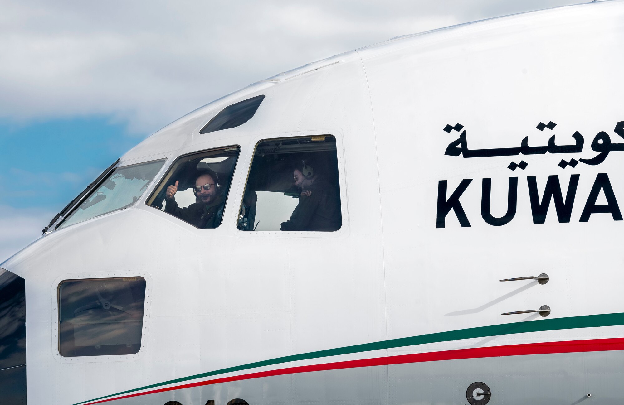 A Kuwait air force pilot gives a thumbs-up to Team Dover Airmen upon arrival at Dover Air Force Base, Delaware, Jan. 22, 2021. This year, the U.S. and Kuwait celebrate the 30th anniversary of Operation Desert Storm, which serves as a key milestone in U.S.-Kuwaiti cooperation and helped cement Kuwait’s role as a regional leader in the promotion of peace and security. Due to its strategic geographic location, Dover AFB supports approximately $3.5 billion worth of foreign military sales operations annually. (U.S. Air Force photo by Senior Airman Christopher Quail)