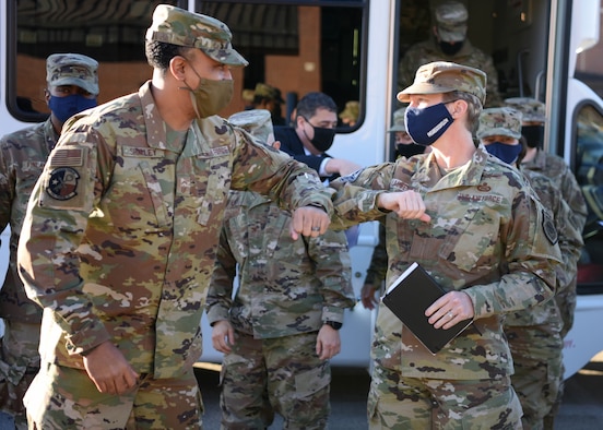 U.S. Air Force Maj. Gen. Leah Lauderback, director of Intelligence, Surveillance, and Reconnaissance, U.S. Space Force, greets Senior Master Sgt. Aaron Shirley, 316th Training Squadron superintendent, outside of the 316th TRS dormitory on Goodfellow Air Force Base, Texas, Jan. 26, 2021. Lauderback toured the installation to learn how Goodfellow members adapted to COVID-19 and accelerated their intelligence training. (U.S. Air Force photo by Airman 1st Class Ethan Sherwood)