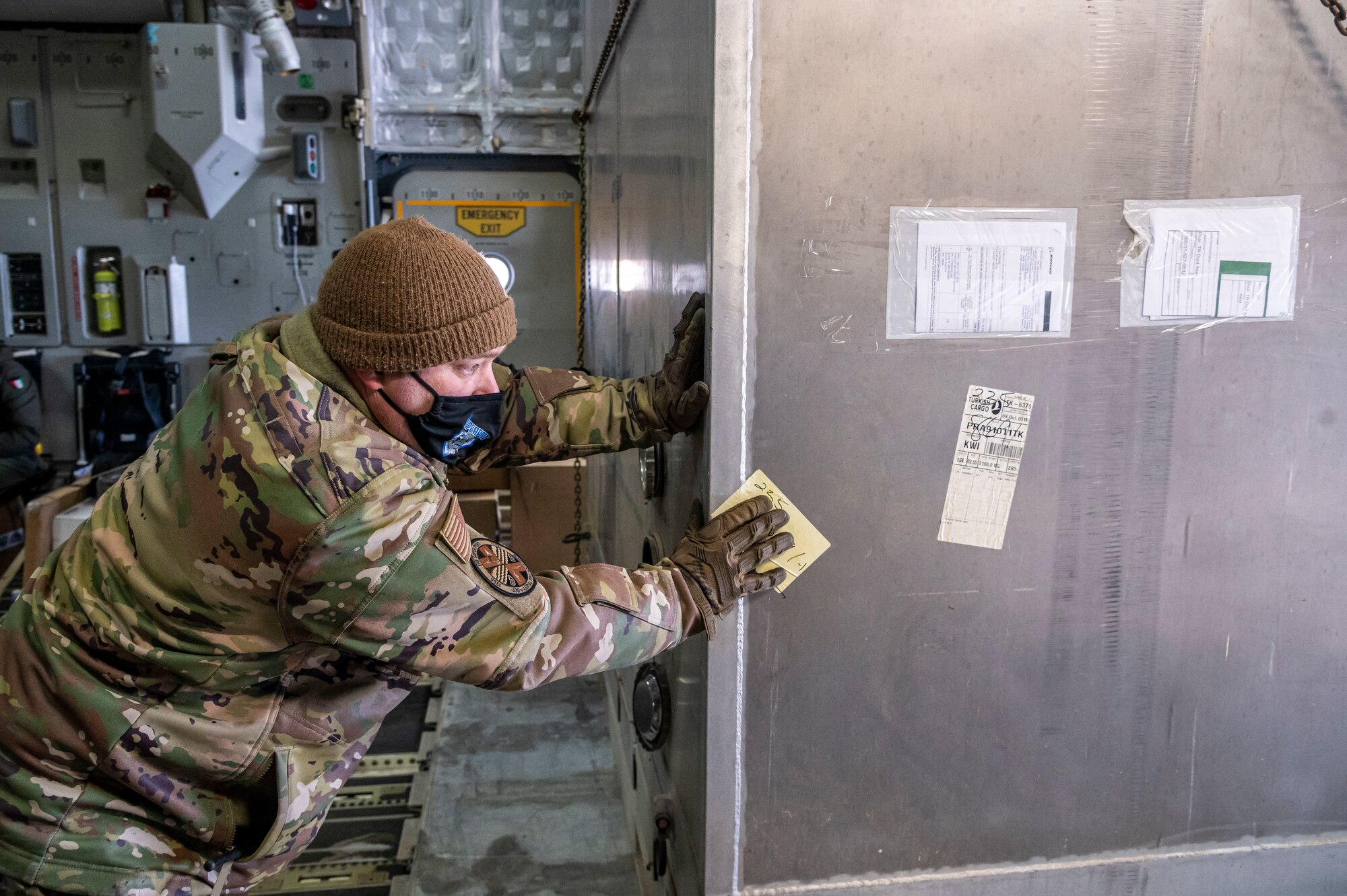 Tech. Sgt. Ryan Price, 436th Aerial Port Squadron ramp operations shift supervisor, unloads cargo from a Kuwait air force C-17 Globemaster III at Dover Air Force Base, Delaware, Jan. 22, 2021. The U.S. strongly supports Kuwait’s sovereignty, security and independence as well as its multilateral diplomatic efforts to build greater cooperation in the region. Due to its strategic geographic location, Dover AFB supports approximately $3.5 billion worth of foreign military sales operations annually. (U.S. Air Force photo by Senior Airman Christopher Quail)