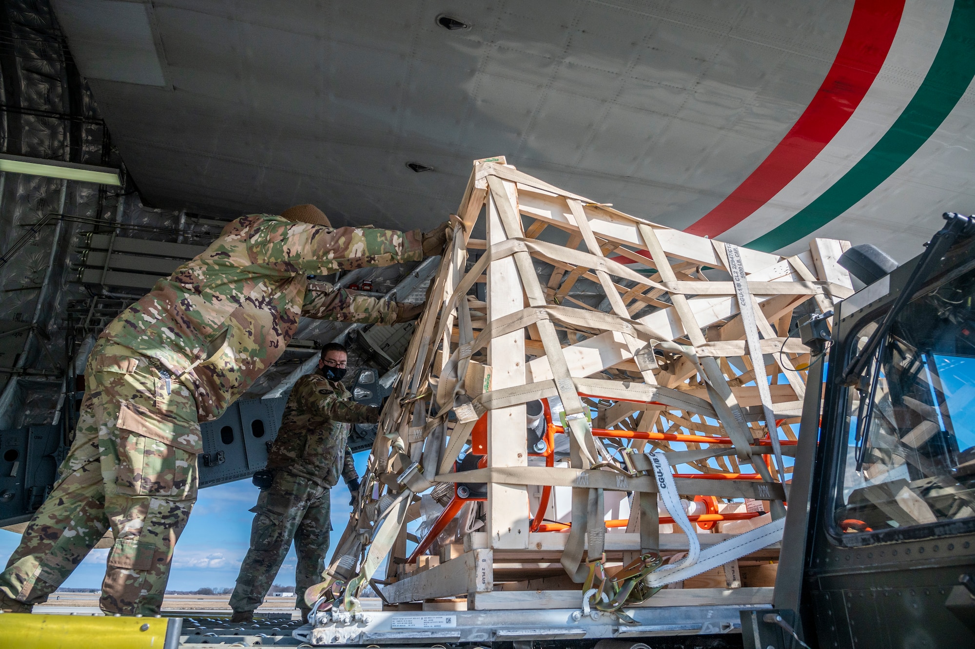 Airmen from the 436th Aerial Port Squadron unload cargo from a Kuwait air force C-17 Globemaster III at Dover Air Force Base, Delaware, Jan. 22, 2021. The U.S. strongly supports Kuwait’s sovereignty, security and independence as well as its multilateral diplomatic efforts to build greater cooperation in the region. Due to its strategic geographic location, Dover AFB supports approximately $3.5 billion worth of foreign military sales operations annually. (U.S. Air Force photo by Senior Airman Christopher Quail)