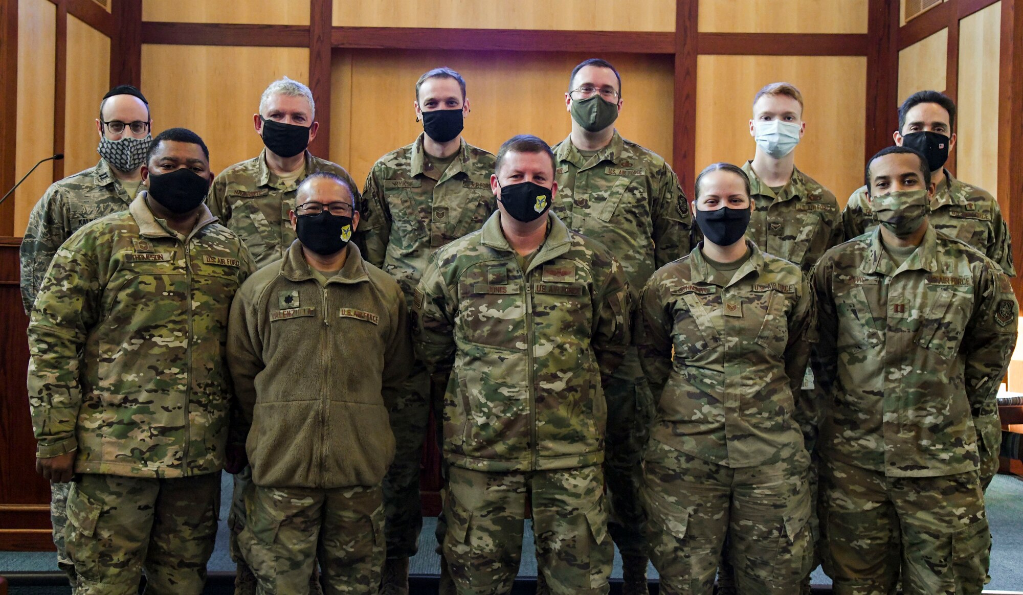 Col. Matthew Jones, 436th Airlift Wing commander, poses for a group photo with Airmen from the 436th AW chapel at Chapel 1 on Dover Air Force Base, Delaware, Jan. 21, 2021. The Air Force Chaplain Corps provides religious support to all Airmen and their authorized dependents, ensuring they can use their constitutional right to the free exercise of religion. (U.S. Air Force photo by Airman 1st Class Stephani Barge)