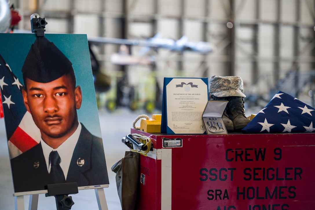 Airmen from 412th Maintenance Squadron held a memorial ceremony for Senior Airman Robert Holmes, Jr., at Edwards Air Force Base, California, Jan. 29. Holmes was assigned to the 416th Aircraft Maintenance Unit Weapons Section, where he worked as a weapons load crew team member on a fleet of 25 F-16 Fighting Falcons. Holmes was  awarded Air Force Achievement Medal posthumously. (Air Force photo by Giancarlo Casem)