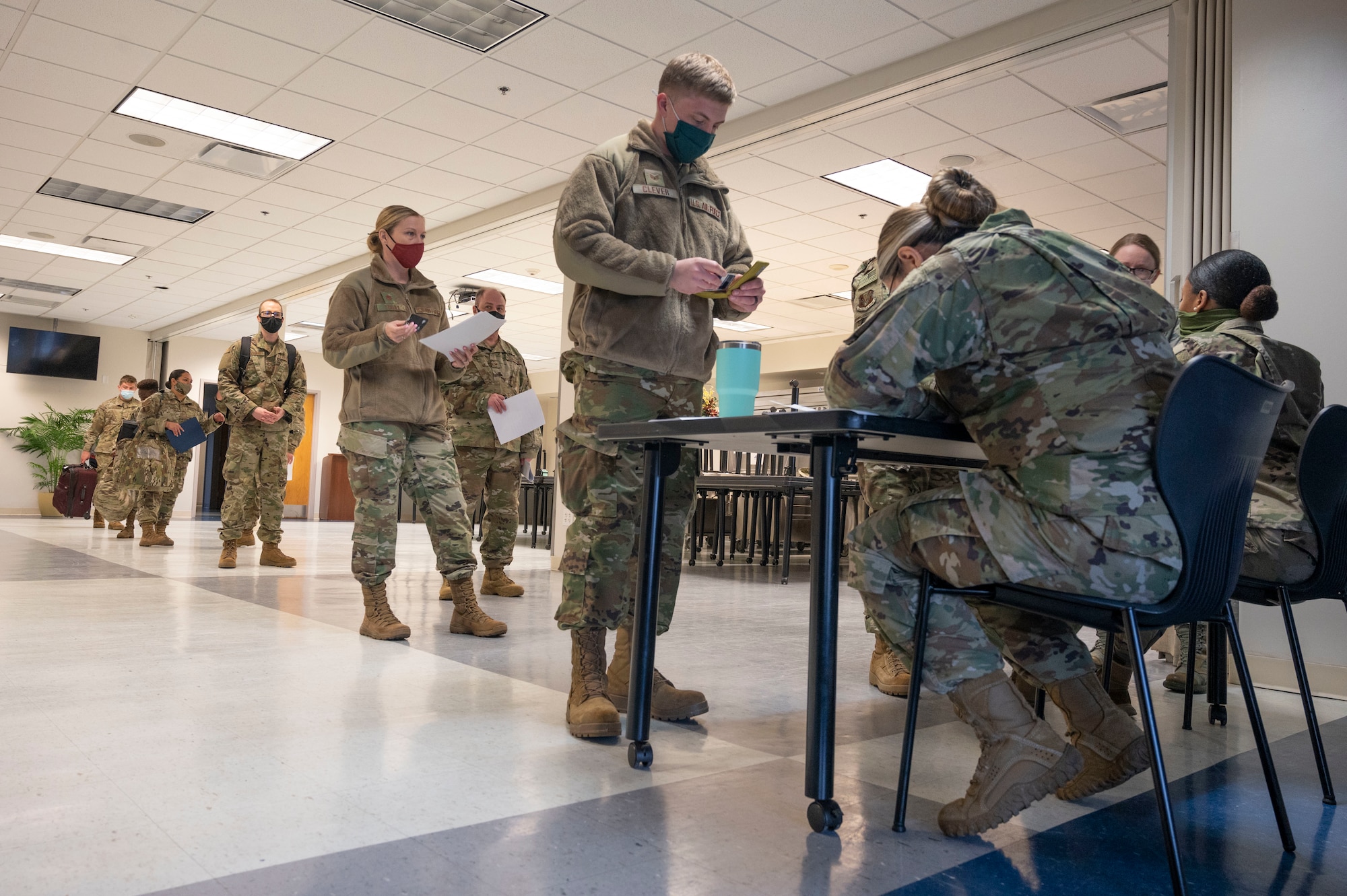 About half of the 60 Florida National Guard Airmen activated to support the COVID-19 vaccination mission at Regency Mall outprocess at the 125th Fighter Wing in Jacksonville, Florida, Feb. 1, 2021.