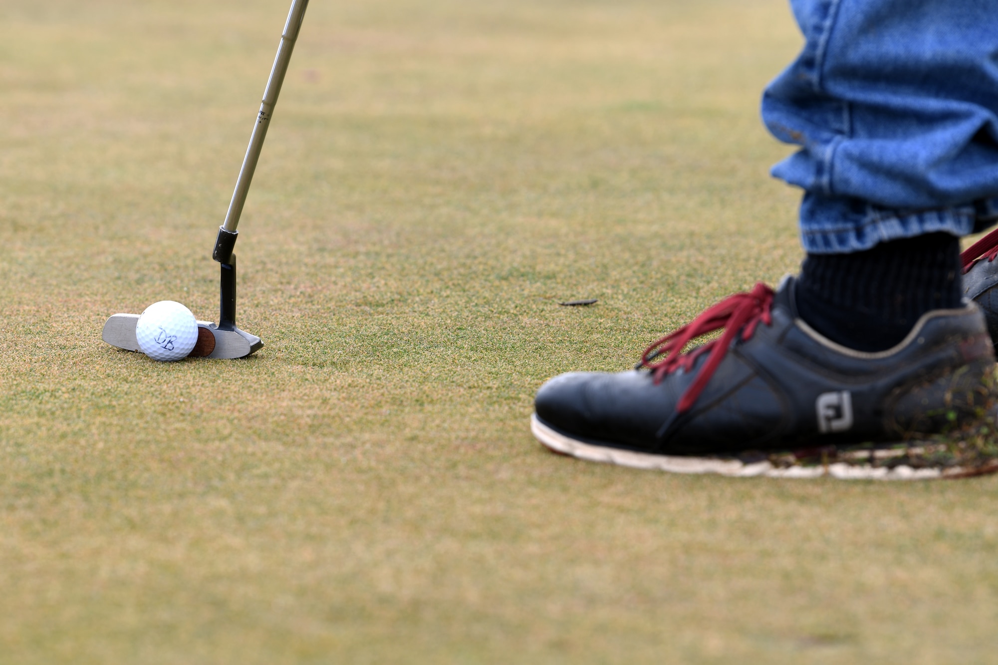 Retired U.S. Air Force Staff Sgt. Denis Bissell prepares to putt a golf ball at the Coyote Run Golf Course Jan. 29, 2021 at Beale Air Force Base, California. Coyote Run Golf Course is currently in the process of being closed down due to decreased utilization and revenue generated from the course. (U.S. Air force photo by Airman 1st Class Luis A. Ruiz-Vazquez)