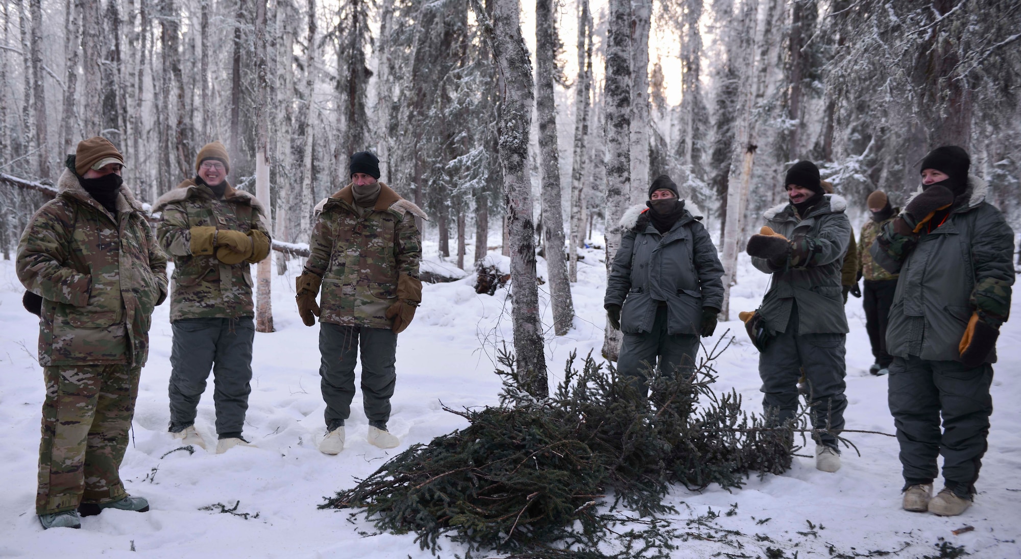 Distinguished leaders from the 58th Special Operations Wing interact with Arctic Survival Training students during a leadership immersion on Eielson Air Force Base, Alaska, Jan. 27, 2021.