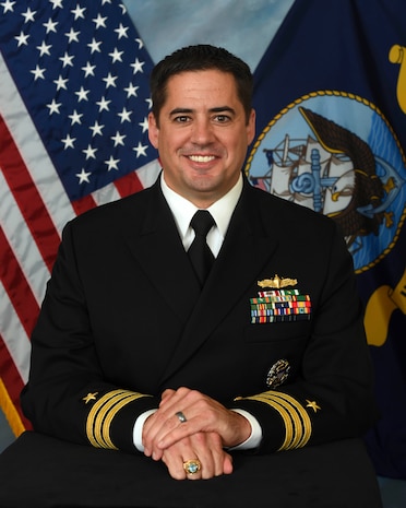 Studio portrait of Cmdr. Ryan Kendall