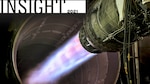 An F-15 aircraft engine burns bright during a test.