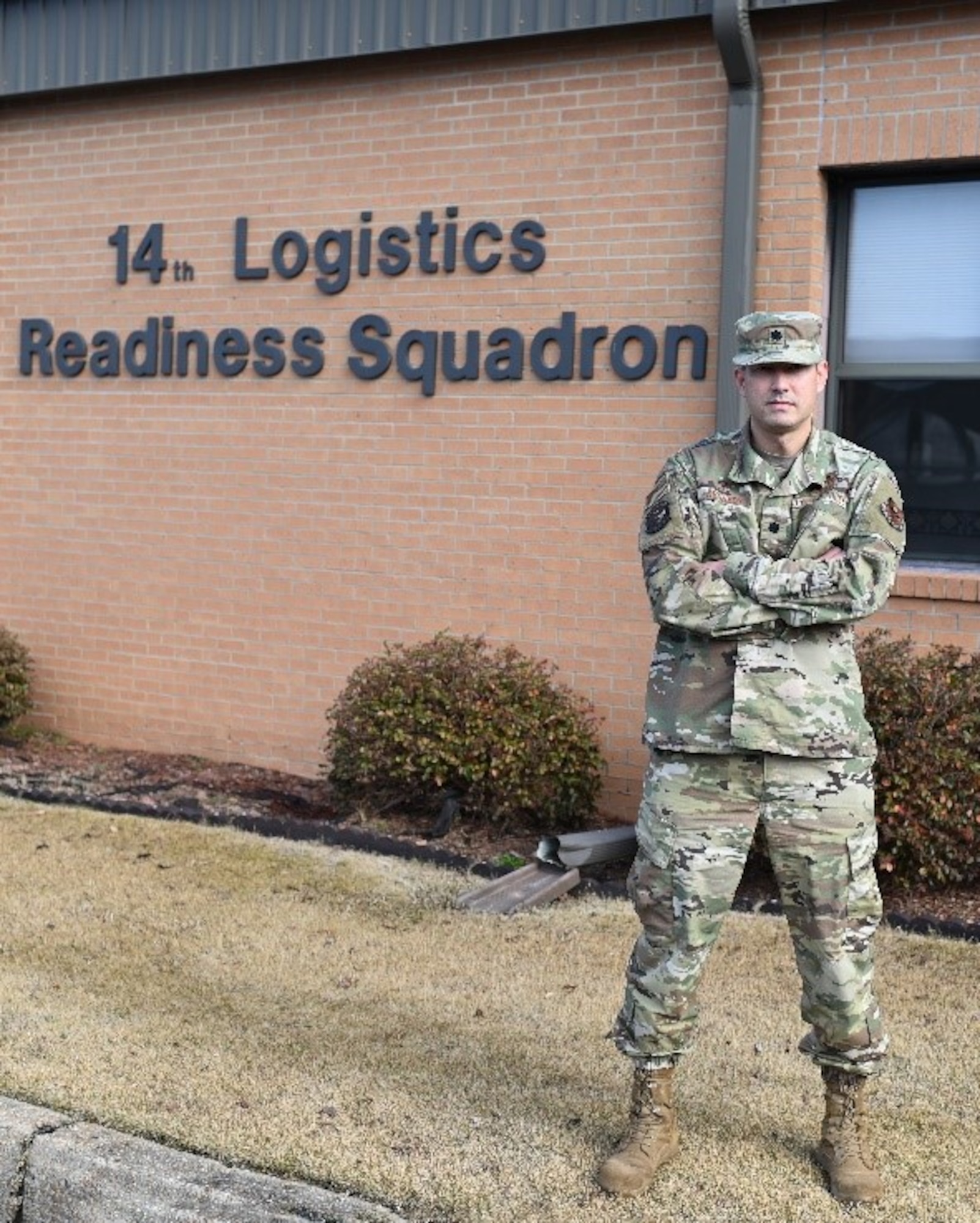 U.S. Air Force Lt. Col. Michael Kennedy, 14th Logistics Readiness Squadron commander, stands in front of the 14th LRS building on Jan. 27, 2021, at Columbus Air Force Base, Miss. The 14th LRS provides effective logistics support for the 14th Flying Training Wing's flying training mission. (U.S. Air Force photo by Airman 1st Class Davis Donaldson)