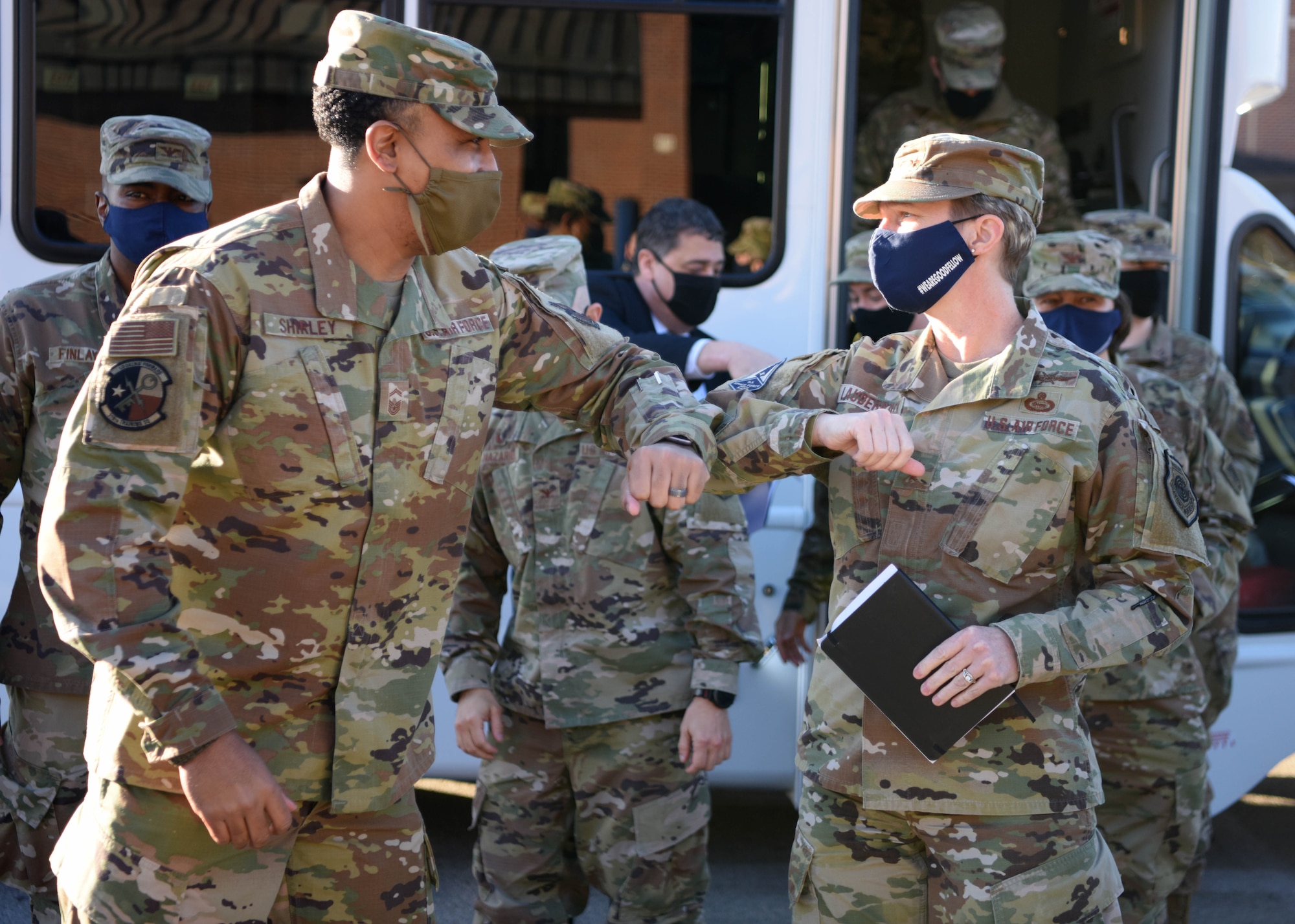 U.S. Air Force Maj. Gen. Leah Lauderback, director of Intelligence, Surveillance, and Reconnaissance, U.S. Space Force, greets Senior Master Sgt. Aaron Shirley, 316th Training Squadron superintendent, outside of the 316th TRS dormitory on Goodfellow Air Force Base, Texas, Jan. 26, 2021. Lauderback toured the installation to learn how Goodfellow members adapted to COVID-19 and accelerated their intelligence training. (U.S. Air Force photo by Airman 1st Class Ethan Sherwood)