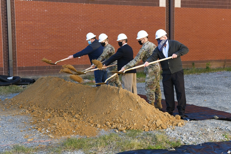 Group of people with shovels