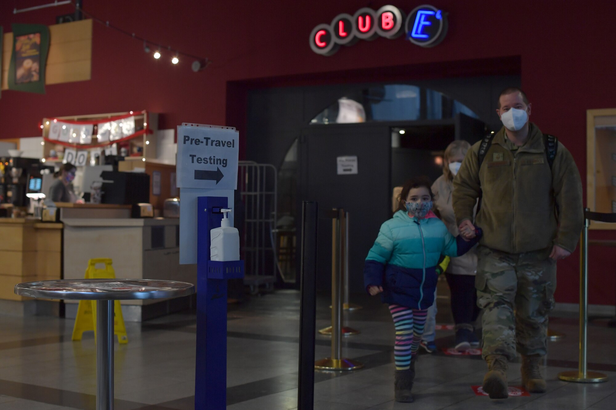 U.S. Air Force Senior Master Sgt. Jacob Schuhardt, 86th Airlift Wing safety superintendent, leaves the Enlisted Club with his daughter, Elyse Schuhardt, and the rest of his family, after pre-travel COVID-19 testing on Ramstein Air Base, Germany, Jan. 28, 2021.