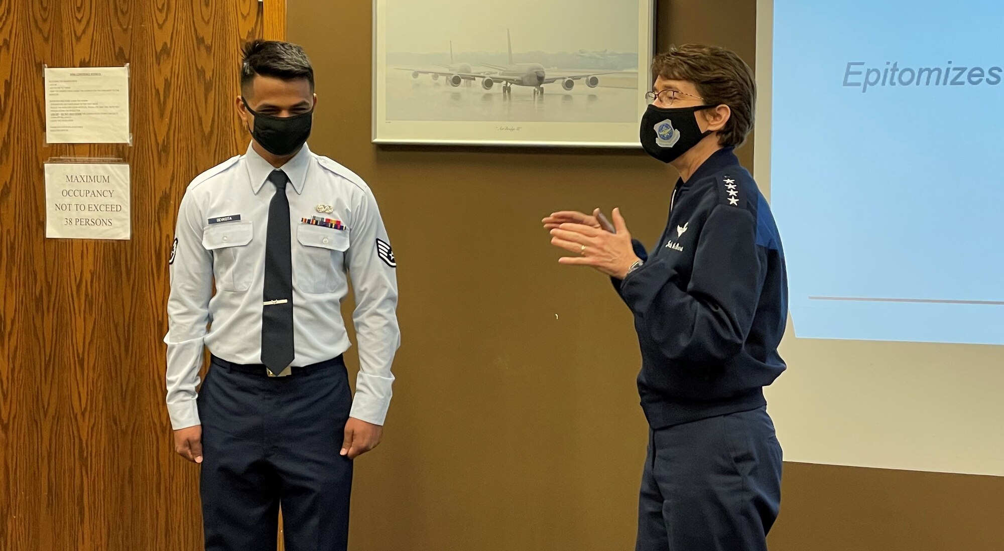 Gen. Jacqueline Van Ovost, Air Mobility Command commander, recognized AMC Phoenix Spark Tank finalist, Staff Sgt. Santosh Devkota, 69th APS passenger services supervisor, as a stellar performer during her visit here, Jan. 25, 2021.