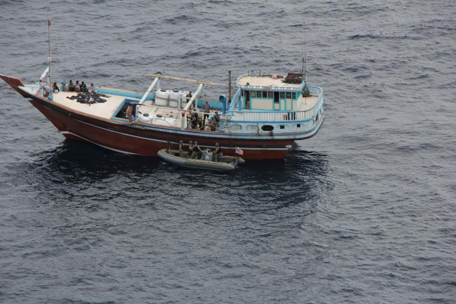 Sailors from USS Philippine Sea (CG 58) interdict a suspected drug shipment in the north Arabian Sea.