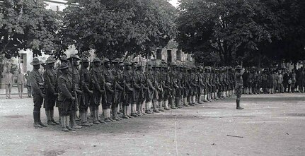 The 370th Infantry Regiment on parade in France.