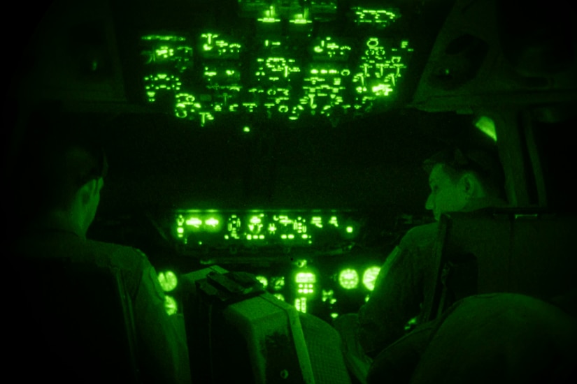 Photo of Airmen flying in a KC-10 Extender.