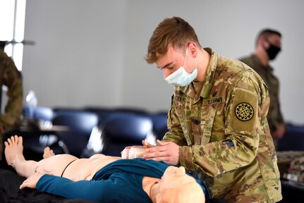 Medics with the Michigan Army National Guard attend a National Registry of Emergency Medical Technicians (NREMT) certification course, Fort Custer Training Center, Augusta, Mich., Jan 27, 2021. These medical professionals are required to complete sustainment training every 24 months.