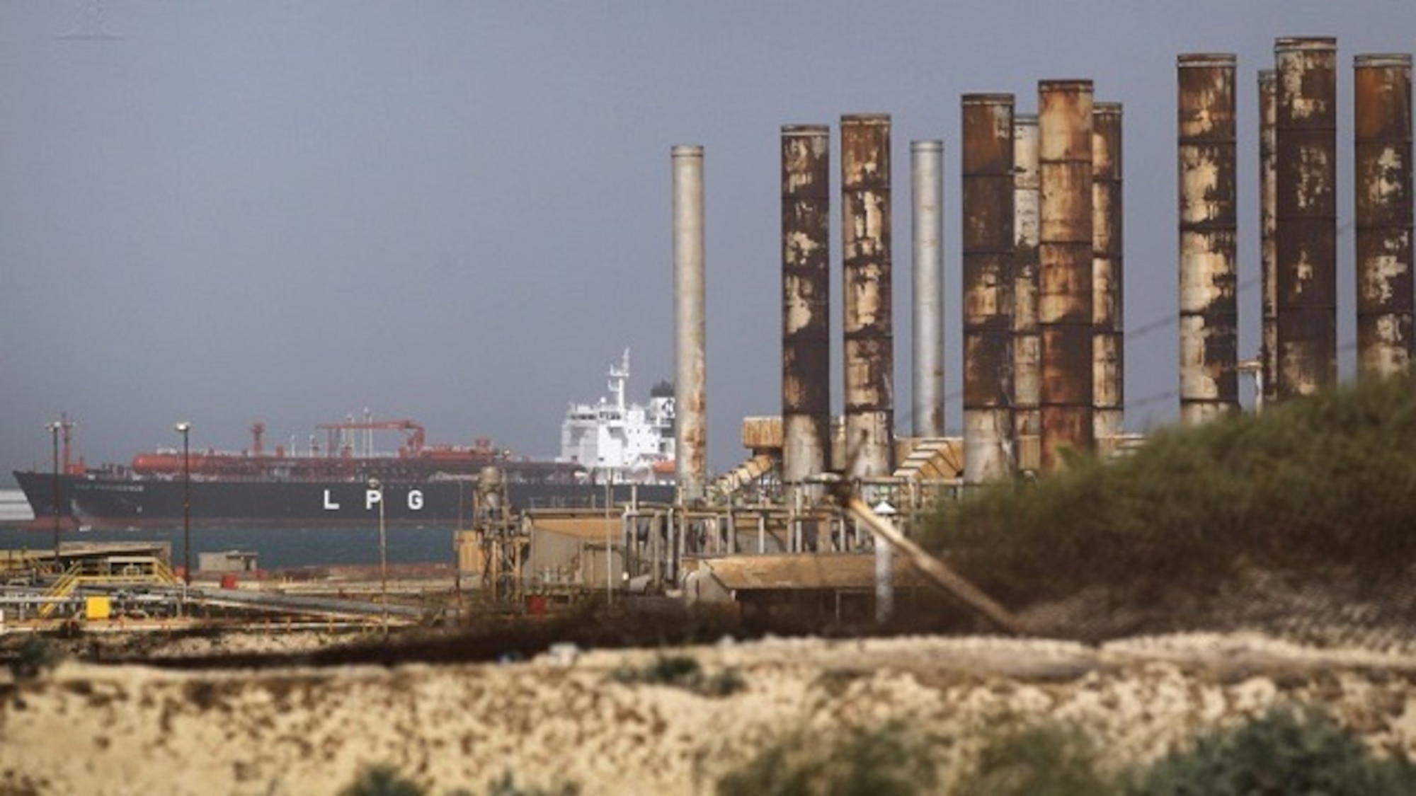 AL BREGA, LIBYA - FEBRUARY 27:  A tanker sits docked at a Libyan oil facility in a rebel-held area February 27, 2011 in Al Brega, Libya. The opposition leadership has stressed that oil faciities in their territory are safe, despite the conflict roiling the country. Libya has the largest oil reserves in Africa and petroleum exports account for 95 percent of the country's export earnings. The opposition has consolidated its power in eastern Libya with President Gaddafi still in control of much of the west, including the capitol Tripoli.  (Photo by John Moore/Getty Images)