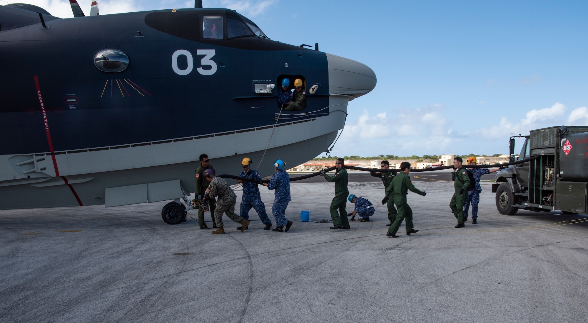 A Koku Jieitai (Japan Air Self Defense Force) US-2 is refueled by U.S. and JASDF service members during Exercise Cope North 20 at Andersen Air Force Base, Guam, Feb. 20, 2020. The 36th Logistics Readiness Squadron Fuels Management Flight won the Pacific Air Forces Best Fuel Flight for 2019, and is one of three bases considered to win the American Petroleum Institute Award, an award given to the best fuels team in the U.S. Air Force. Cope North 20 is an annual trilateral field training exercise conducted at Andersen AFB and around the Commonwealth of the Northern Mariana Islands (CNMI), Palau and Yap in the Federated States of Micronesia. (U.S. Air Force photo by Airman 1st Class Michael S. Murphy)