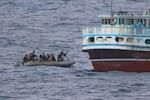 Visit, board, search and seizure sailors assigned to guided-missile cruiser USS Philippine Sea board a dhow suspected of carrying narcotics in the international waters of the North Arabian Sea, Jan. 31. (U.S. Navy photo)
