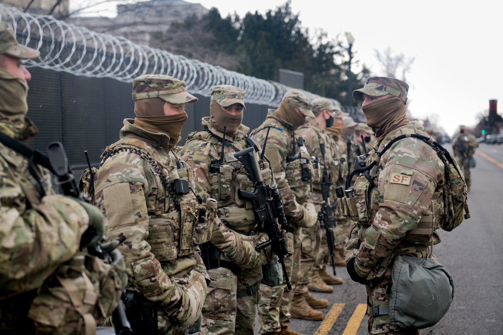 A U.S. Airman with the Oklahoma National Guard provides updates to his team while providing security near the U.S. Capitol building, Washington, D.C., Jan. 20, 2021. At least 25,000 National Guard men and women have been authorized to conduct security, communication and logistical missions in support of federal and District authorities leading up and through the 59th Presidential Inauguration. (U.S. Air National Guard photo by Tech. Sgt. Rebecca Imwalle)