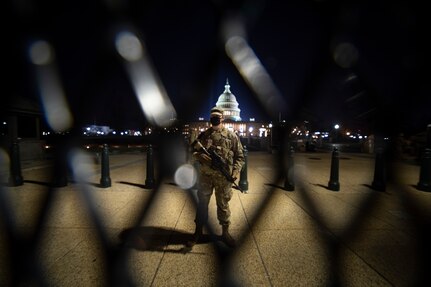 An Oklahoma Army National Guard Soldier stands watch at the U.S. Capitol building, Jan. 19, 2021. At least 25,000 National Guard men and women have been authorized to conduct security, communication and logistical missions in support of federal and District authorities leading up to and through the 59th Presidential Inauguration. (U.S. National Guard photo by Sgt. Anthony Jones)