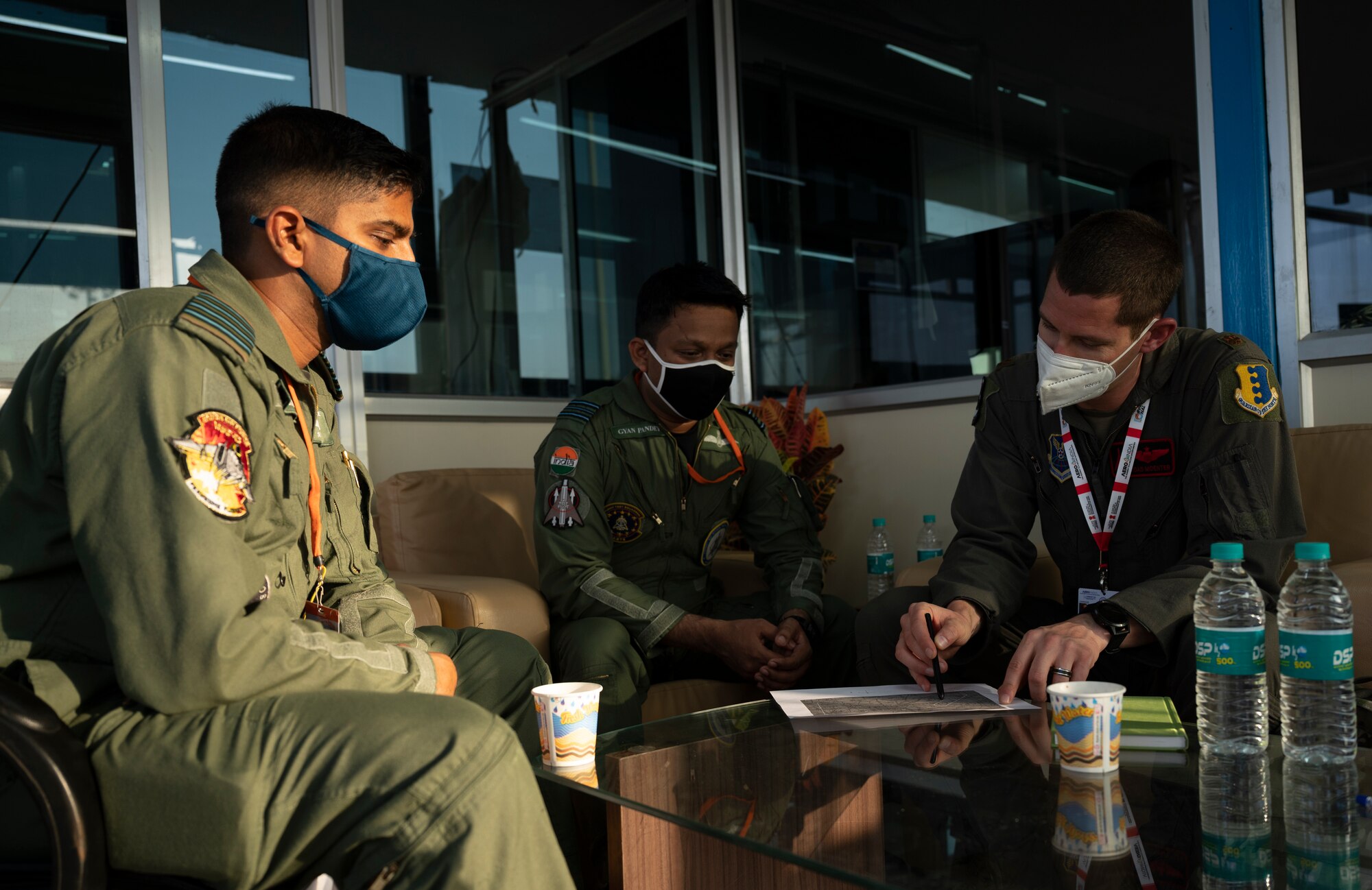 Maj. Andrew Moenter, a 34th Expeditionary Bomb Squadron pilot, meets with Indian Air Force pilots in preparation of the B-1B Lancer’s participation in Aero India 2021, at Yelahanka Air Force Base in Bengaluru, India, Feb. 1, 2021. Aero India is an ideal forum to showcase U.S. defense aircraft and equipment and ultimately contribute toward compatibility and interoperability with other countries. (U.S. Air Force photo by Senior Airman Christina Bennett)