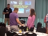 U.S. Army Reserve Chief Warrant Officer 5 Michael A. Rich (left) speaks as Soldiers and Families of the U.S. Army Civil Affairs and Psychological Operations Command (Airborne) meet for a Strong Bonds training event in Myrtle Beach, S.C., Aug. 25-26, 2018.
