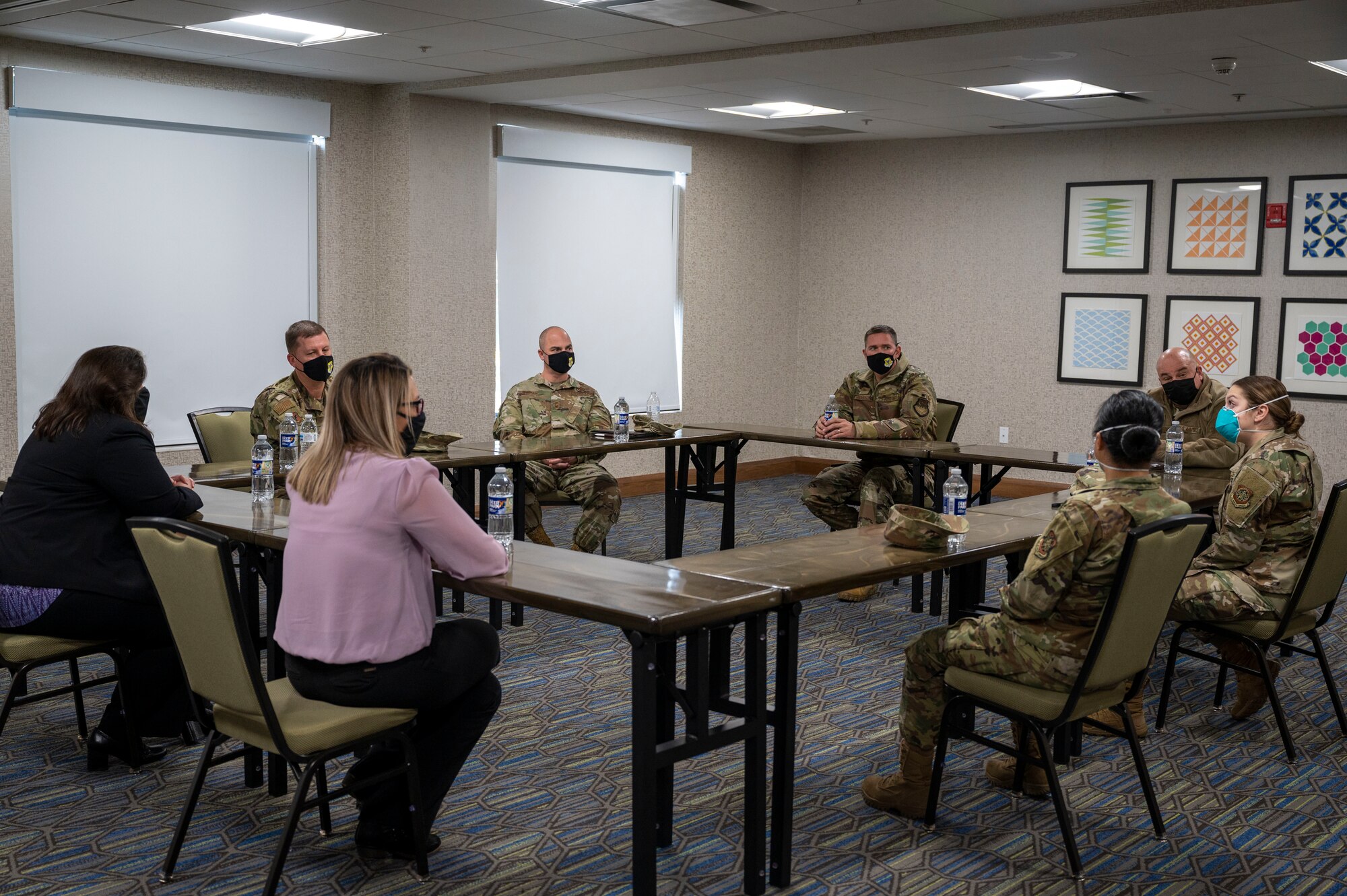 Col. Matthew Jones, 436th Airlift Wing commander, speaks at a roundtable discussion during a tour of a hotel in Baltimore, Maryland, Jan. 15, 2021.The hotel serves as an isolation location for Patriot Express service members who test positive for COVID-19 at the Baltimore/Washington International Thurgood Marshall Airport testing center. These service members and their families receive medical care and follow-on logistical support from Dover Air Force Base personnel.(U.S. Air Force photo by Airman 1st Class Cydney Lee)