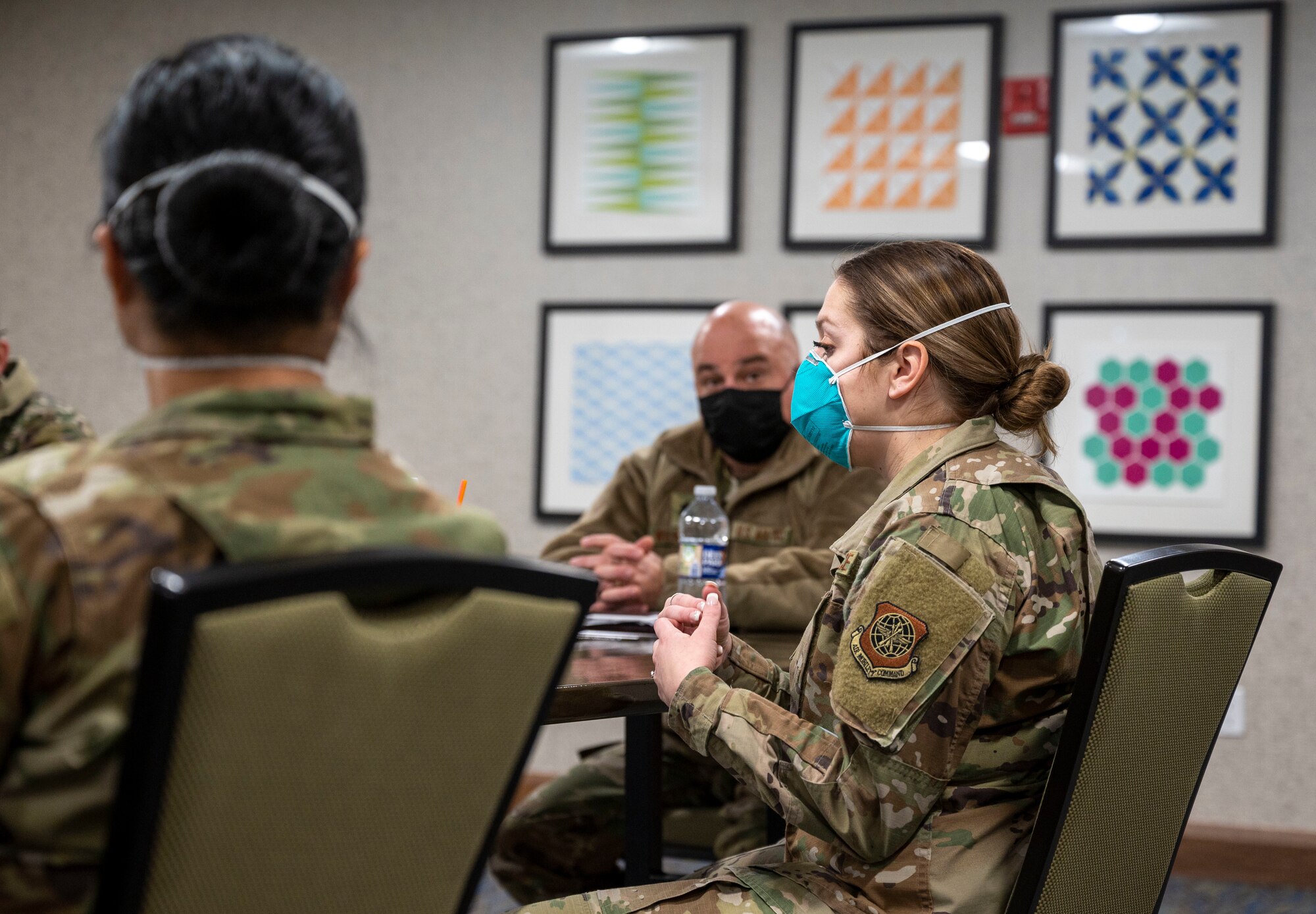 1st Lt. Morgan Prestridge, 436th Mission Support Group executive officer, speaks with Col. Matthew Jones, 436th Airlift Wing commander, during a tour of a hotel in Baltimore, Maryland, Jan. 15, 2021. The hotel serves as an isolation location for Patriot Express service members who test positive for COVID-19 at the Baltimore/Washington International Thurgood Marshall Airport testing center. These service members and their families receive medical care and follow-on logistical support from Dover Air Force Base personnel. (U.S. Air Force photo by Airman 1st Class Cydney Lee)