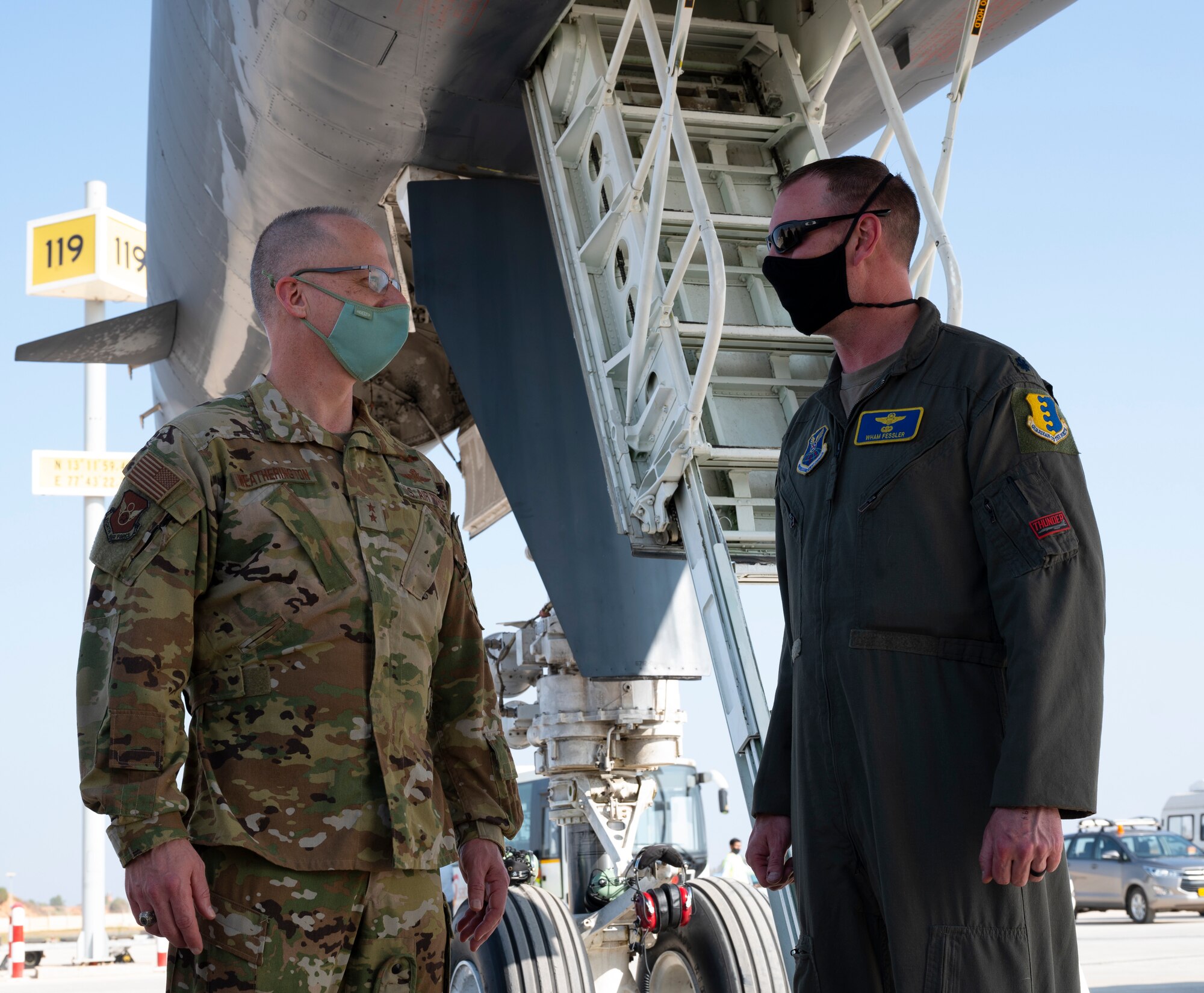 Maj. Gen. Mark Weatherington, the Eighth Air Force commander, greets Lt. Col. Michael Fessler, the 34th Expeditionary Bomb Squadron commander, at Kempegowda International Airport in Bengaluru, India, Feb. 1, 2021. Fessler was part of a four-member crew that flew a B-1B Lancer from Ellsworth Air Force Base, S.D., to India to participate in the Aero India 2021 tradeshow. The non-stop, 26-hour sortie demonstrates the long-range capabilities of the B-1B and its aircrew. (U.S. Air Force photo by Senior Airman Christina Bennett)