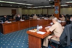 210203-N-EI510-0016 NAVAL SUPPORT ACTIVITY NAPLES, Italy Feb 03, 2021 - U.S. Naval Forces Europe-Africa Fleet Master Chief Derrick Walters, center, and Command Master Chief Johannes Gonzalez, U.S. Sixth Fleet Command Master Chief, center right, address attendees at a Command Senior Enlisted Symposium at Naval Support Activity Naples, Italy, Feb. 03, 2021. U.S. Naval Forces Europe-Africa, headquartered in Naples, Italy, Conducts the full spectrum of joint and naval operations, often in concert with allied and interagency partners in order to advance U.S. national interests and security and stability in Europe and Africa. (U.S. Navy Photo by Mass Communication Specialist 2nd Class Scott Barnes/Released)
