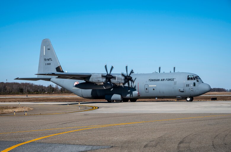 A Tunisian air force C-130J Super Hercules arrives for a foreign military sales mission at Dover Air Force Base, Delaware, Jan. 28, 2021. The U.S. was the first major power to recognize Tunisian sovereignty and established relations with Tunisia in 1956 following its independence from France. Since then, Tunisia has become an even more critical partner and a major non-NATO ally, which entails military and economic privileges and is a powerful symbol of the close relationship between the U.S. and Tunisia. Due to its strategic geographic location, Dover AFB supports approximately $3.5 billion worth of FMS operations annually. (U.S. Air Force photo by Senior Airman Christopher Quail)