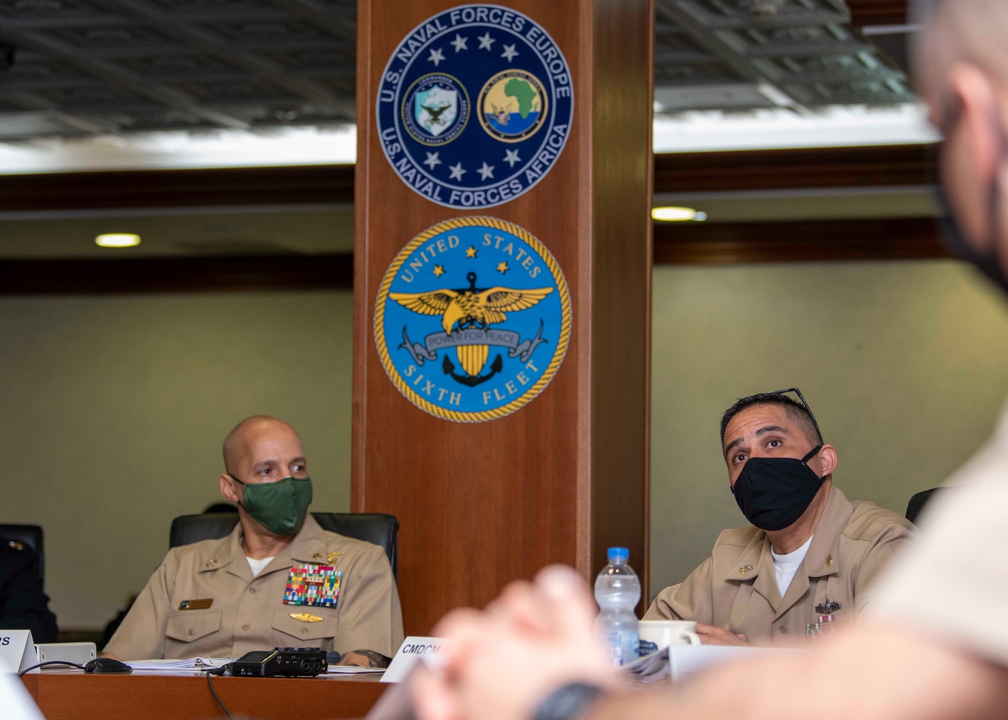 210203-N-EI510-0008 NAVAL SUPPORT ACTIVITY NAPLES, Italy (Feb. 03, 2021) - U.S. Naval Forces Europe-Africa Fleet Master Chief Derrick Walters, center, and Command Master Chief Johannes Gonzalez, U.S. Sixth Fleet Command Master Chief, center right, address attendees at a Command Senior Enlisted Symposium at Naval Support Activity Naples, Italy, Feb. 03, 2021. U.S. Naval Forces Europe-Africa, headquartered in Naples, Italy, Conducts the full spectrum of joint and naval operations, often in concert with allied and interagency partners in order to advance U.S. national interests and security and stability in Europe and Africa. (U.S. Navy Photo by Mass Communication Specialist 2nd Class Scott Barnes/Released)