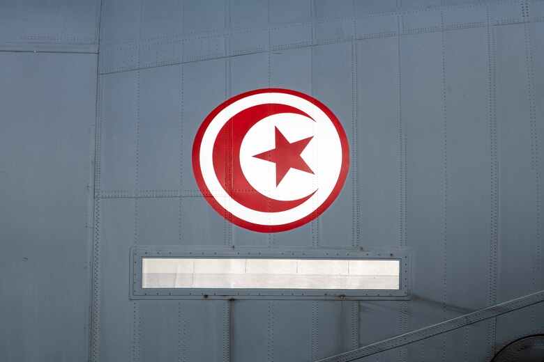 A Tunisian air force C-130J Super Hercules sits on the flight line following the completion of a foreign military sales mission at Dover Air Force Base, Delaware, Jan. 28, 2021.The U.S. was the first major power to recognize Tunisian sovereignty and established relations with Tunisia in 1956 following its independence from France. Since then, Tunisia has become an even more critical partner and a major non-NATO ally, which entails military and economic privileges and is a powerful symbol of the close relationship between the U.S. and Tunisia. Due to its strategic geographic location, Dover AFB supports approximately $3.5 billion worth of FMS operations annually. (U.S. Air Force photo by Senior Airman Christopher Quail)