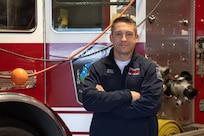 Mr. Brannon Soter stands for a portrait at the 158th Fighter Wing fire department.