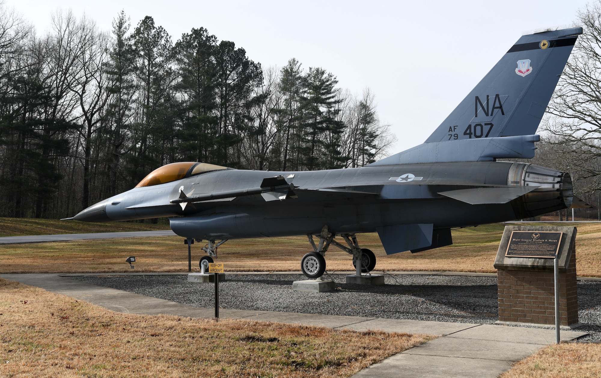 An F-16 Fighting Falcon dedicated in memory of Maj. Gen. Winfield Harpe, U.S. Air Force, sits on display outside of Gate 2 at Arnold Air Force Base, Tenn., Jan. 6, 2021. (U.S. Air Force photo by Jill Pickett)