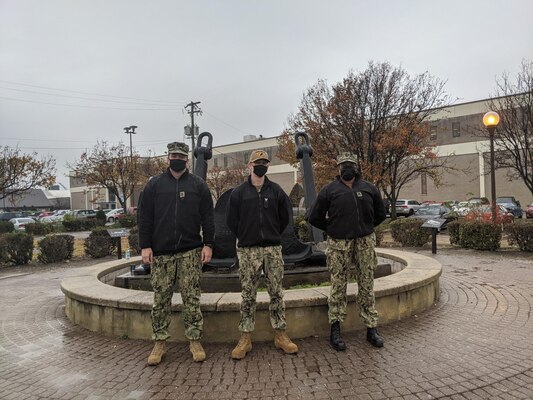 Members of the Naval Information Warfare Systems Command Reserve Program pose for a photo after conducting a site survey.