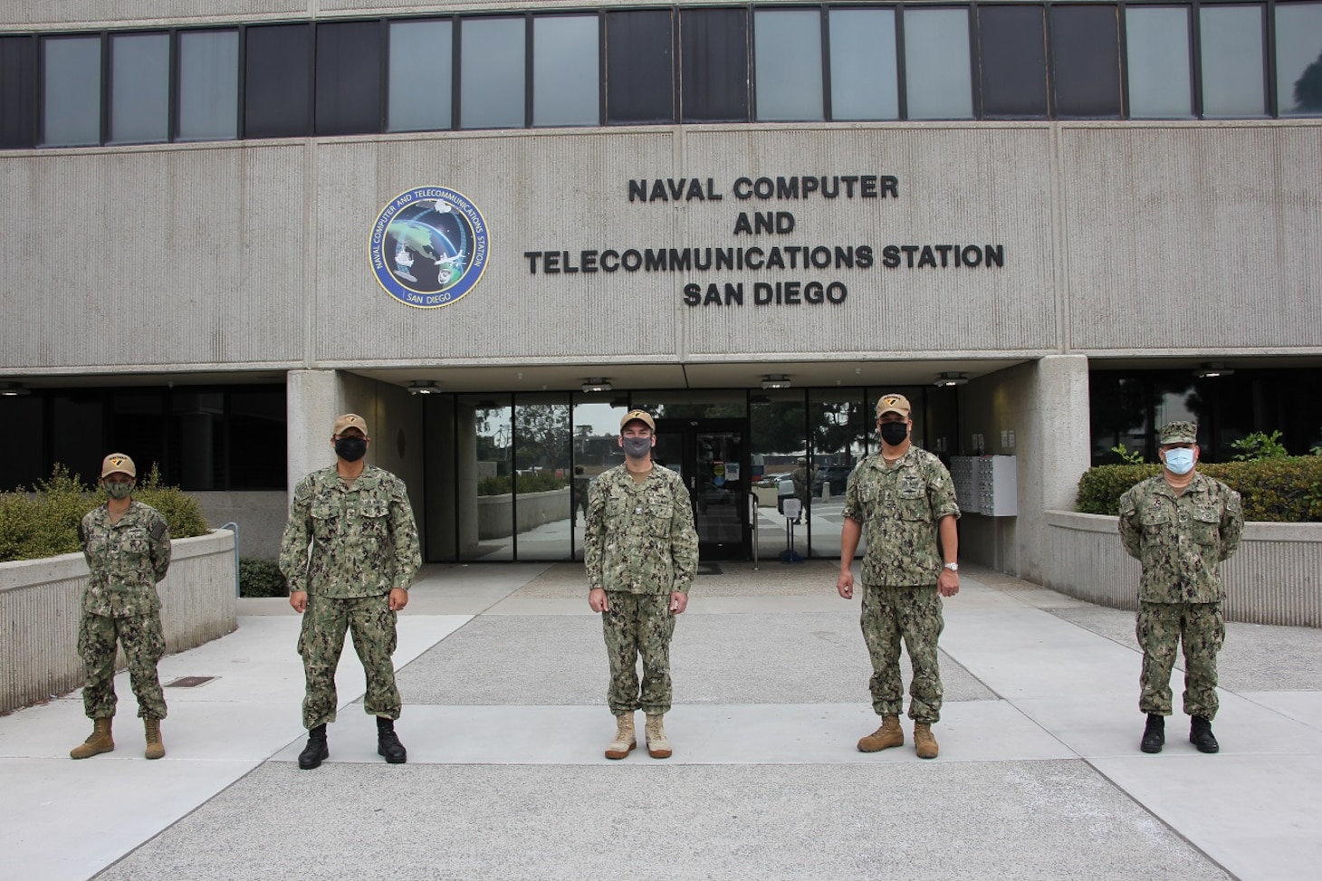 Members of the Naval Information Warfare Systems Command Reserve Program pose for a photo after conducting a site survey.