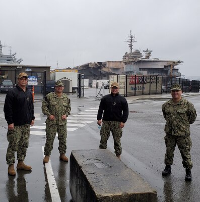 Members of the Naval Information Warfare Systems Command Reserve Program pose for a photo after conducting a site survey.