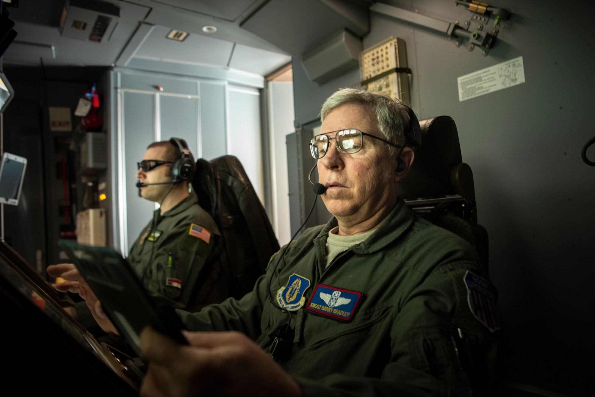 Senior Master Sgt. Barry Bradley, 77th Air Refueling Wing boom operator (front), preforms necessary inspections for the boom lift at Seymour Johnson Air Force Base, North Carolina on Jan. 21, 2021.