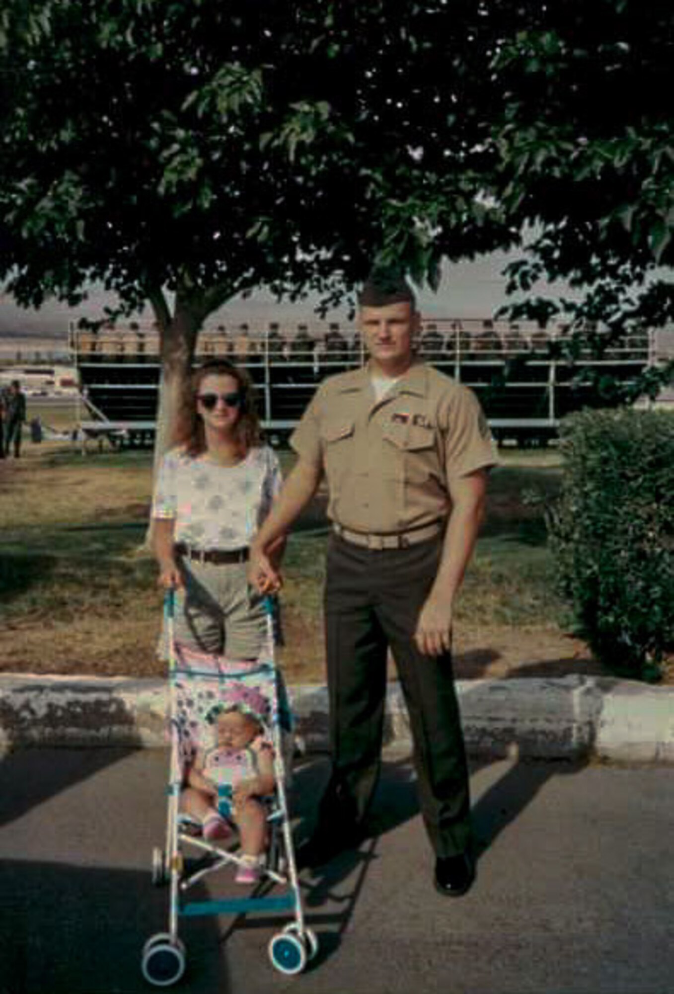 Larry Shanes A-School graduation photo with wife and daughter.