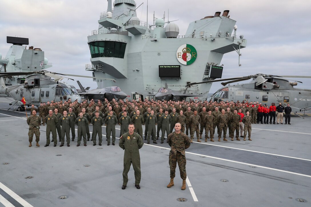 HMS QUEEN ELIZABETH CARRIES OUT EXERCISES AT SEA

Departmental photos taken on the flight deck of HMS Quen Elizabeth on 11th October 2020.

HMS Queen Elizabeth has embarked two squadrons of F-35B stealth jets: the UK�s 617 Sqn and US Marine Corps fighter attack squadron 211. Alongside eight Merlin helicopters of 820 and 846 Naval Air Squadrons it is the largest air group to operate from a Royal Navy carrier in more than thirty years, and the largest air group of fifth generation fighters at sea anywhere in the world. This month�s Group Exercise (�GROUPEX�) will see HMS Queen Elizabeth joined by warships from the UK, US and the Netherlands, which will accompany the carrier on her first global deployment in 2021. However, before then, the newly-formed Carrier Strike Group will be put through its paces off the north east coast of Scotland as part of Joint Warrior, NATO�s largest annual exercise.